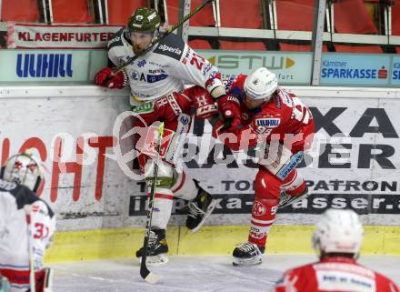 EBEL. Eishockey Bundesliga. KAC gegen	HCB Suedtirol Alperia. Daniel Obersteiner,  (KAC),  Dennis Robertson (Bozen). Klagenfurt, am 18.4.2021.
Foto: Kuess
www.qspictures.net

---
pressefotos, pressefotografie, kuess, qs, qspictures, sport, bild, bilder, bilddatenbank