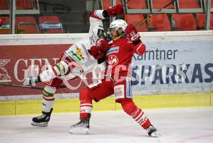 EBEL. Eishockey Bundesliga. KAC gegen	HCB Suedtirol Alperia. Stefan Geier, (KAC),  Daniel Catenacci  (Bozen). Klagenfurt, am 18.4.2021.
Foto: Kuess
www.qspictures.net

---
pressefotos, pressefotografie, kuess, qs, qspictures, sport, bild, bilder, bilddatenbank