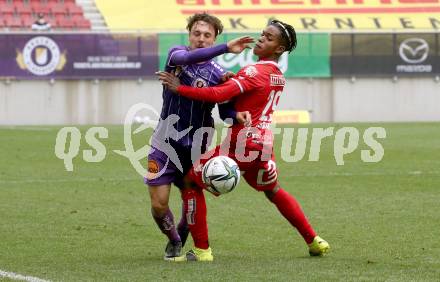 Fussball 2. Liga. SK Austria Klagenfurt gegen  Grazer AK 1902. Simon Straudi,  (Klagenfurt),  Reality Arase Asemota  (GAK). Klagenfurt, am 18.4.2021.
Foto: Kuess
www.qspictures.net
---
pressefotos, pressefotografie, kuess, qs, qspictures, sport, bild, bilder, bilddatenbank