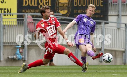 Fussball 2. Liga. SK Austria Klagenfurt gegen  Grazer AK 1902.  Christopher Cvetko, (Klagenfurt),  Peter Tschernegg   (GAK). Klagenfurt, am 18.4.2021.
Foto: Kuess
www.qspictures.net
---
pressefotos, pressefotografie, kuess, qs, qspictures, sport, bild, bilder, bilddatenbank