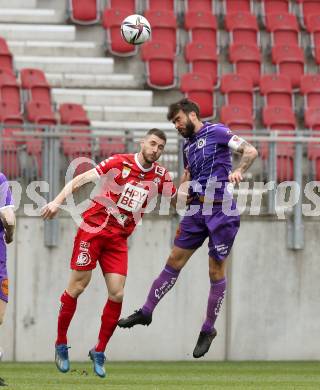 Fussball 2. Liga. SK Austria Klagenfurt gegen  Grazer AK 1902. Kosmas Gkezos, (Klagenfurt),  Petar Zubak   (GAK). Klagenfurt, am 18.4.2021.
Foto: Kuess
www.qspictures.net
---
pressefotos, pressefotografie, kuess, qs, qspictures, sport, bild, bilder, bilddatenbank