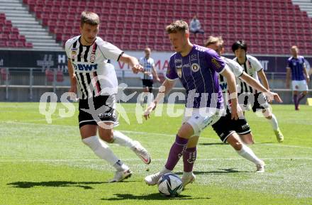 Fussball 2. Liga. SK Austria Klagenfurt gegen FC Juniors OOE. Fabian Misenboeck,  (Klagenfurt), Filip Backulja (Juniors). Klagenfurt, am 9.5.2021.
Foto: Kuess
www.qspictures.net
---
pressefotos, pressefotografie, kuess, qs, qspictures, sport, bild, bilder, bilddatenbank