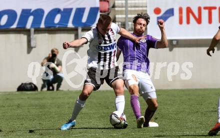 Fussball 2. Liga. SK Austria Klagenfurt gegen FC Juniors OOE. Simon Straudi,  (Klagenfurt), Mirsad Sulejmanovic (Juniors). Klagenfurt, am 9.5.2021.
Foto: Kuess
www.qspictures.net
---
pressefotos, pressefotografie, kuess, qs, qspictures, sport, bild, bilder, bilddatenbank