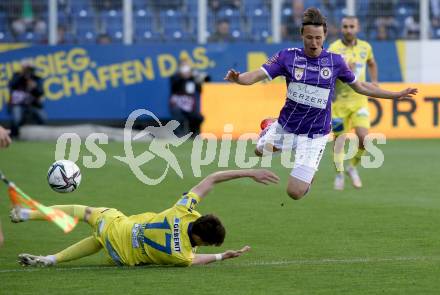 Fussball. Bundesliga Relegation. St. Poelten gegen SK Austria Klagenfurt .   Alex Timossi Andersson,  (St. Poelten), Ahmet Muhamedbegovic  (Klagenfurt). Klagenfurt, am 29.5.2021.
Foto: Kuess
www.qspictures.net
---
pressefotos, pressefotografie, kuess, qs, qspictures, sport, bild, bilder, bilddatenbank