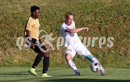 Fussball. Freundschaftsspiel. Koettmannsdorf gegen Austria Klagenfurt.   Confidence Eboigbe Osawe (Koettmannsdorf),   Florian Jaritz (Klagenfurt). Klagenfurt, am 28.6.2021.
Foto: Kuess
www.qspictures.net
---
pressefotos, pressefotografie, kuess, qs, qspictures, sport, bild, bilder, bilddatenbank