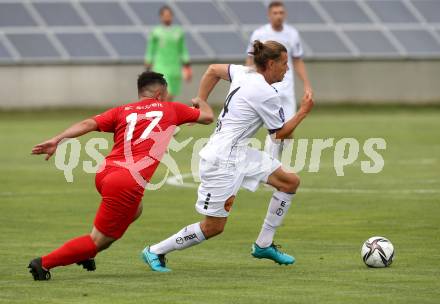 Fussball Bundesliga. Terstspiel. FC St. Veit gegen SK Austria Klagenfurt.  Matthias Herbert Pugganig (St.Veit),  Patrick Greil (Klagenfurt). St. Veit, am 13.7.2021.
Foto: Kuess
---
pressefotos, pressefotografie, kuess, qs, qspictures, sport, bild, bilder, bilddatenbank