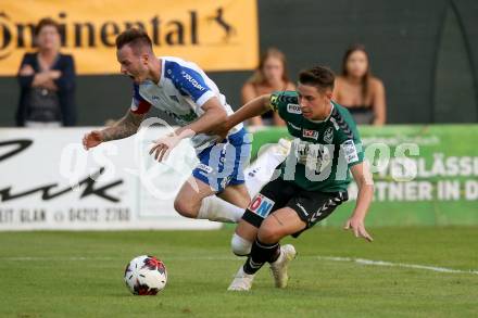 Fussball Regionalliga. SK Treibach gegen Ried Amateure (Junge Wikinger Ried).  Kevin Vaschauner, (Treibach), Nico Wiesinger  (Ried), Treibach, am 23.7.2021.
Foto: Kuess
---
pressefotos, pressefotografie, kuess, qs, qspictures, sport, bild, bilder, bilddatenbank