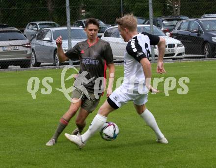 Fussball 1. Klasse B. Kleinkirchheim gegen Velden.  Marcel Michael Trausnitz (Kleinkirchheim),  Niklas Janke  (Velden). Kleinkirchheim, am 25.7.2021.
Foto: Kuess
---
pressefotos, pressefotografie, kuess, qs, qspictures, sport, bild, bilder, bilddatenbank