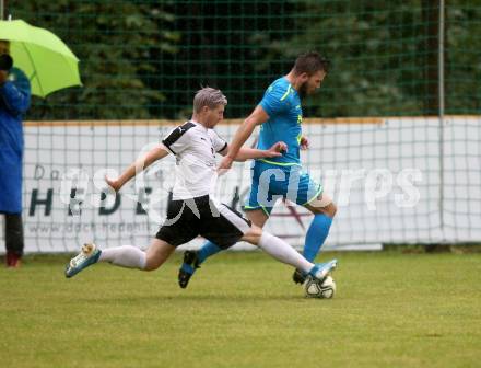 Fussball. Unterliga Ost. Sele Zell gegen Eisenkappel.  Matic Jerina (Sele Zell),   Niko Smrtnik (Eisenkappel). Sele Zell, am 1.8.2021.
Foto: Kuess
www.qspictures.net
---
pressefotos, pressefotografie, kuess, qs, qspictures, sport, bild, bilder, bilddatenbank