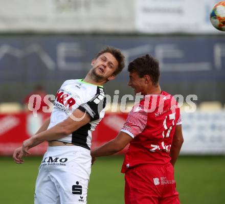 Fussball Kaerntner Liga. St. Andrae/WAC Juniors gegen Feldkirchen.  Nino Emanuel Hartweger (St. Andrae),  Martin Hinteregger (Feldkirchen). St. Andrae, am 27.8.2021.
Foto: Kuess
---
pressefotos, pressefotografie, kuess, qs, qspictures, sport, bild, bilder, bilddatenbank