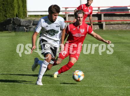 Fussball. Kaerntner Liga. Ferlach Atus gegen St. Michael/Bl..   Christopher Katschnig (Ferlach),  Philipp Gerhard Pachoinig (St. Michael). Ferlach, am 25.9.2021.
Foto: Kuess
www.qspictures.net
---
pressefotos, pressefotografie, kuess, qs, qspictures, sport, bild, bilder, bilddatenbank