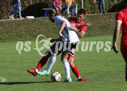 Fussball. Kaerntner Liga. Ferlach Atus gegen St. Michael/Bl..  Martin Sustersic (Ferlach), Arnold Gross  (St. Michael). Ferlach, am 25.9.2021.
Foto: Kuess
www.qspictures.net
---
pressefotos, pressefotografie, kuess, qs, qspictures, sport, bild, bilder, bilddatenbank
