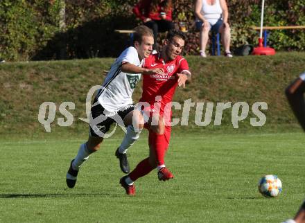 Fussball. Kaerntner Liga. Ferlach Atus gegen St. Michael/Bl.. Martin Sustersic  (Ferlach), Benjamin Opietnik  (St. Michael). Ferlach, am 25.9.2021.
Foto: Kuess
www.qspictures.net
---
pressefotos, pressefotografie, kuess, qs, qspictures, sport, bild, bilder, bilddatenbank