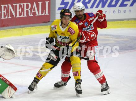 EBEL. Eishockey Bundesliga. KAC gegen	spusu Vienna Capitals. Martin Schumnig,  (KAC), Mathias Boehm  (Vienna Capitals). Klagenfurt, am 1.10.2021.
Foto: Kuess
www.qspictures.net

---
pressefotos, pressefotografie, kuess, qs, qspictures, sport, bild, bilder, bilddatenbank