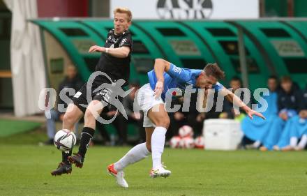 Fussball Testspiel. SK Austria Klagenfurt gegen NK Bravo (SLO).   Christopher Cvetko, (Klagenfurt), Gasper Trdin (SLO). Sportpark Fischl. Klagenfurt, am 8.10.2021.
Foto: Kuess
---
pressefotos, pressefotografie, kuess, qs, qspictures, sport, bild, bilder, bilddatenbank