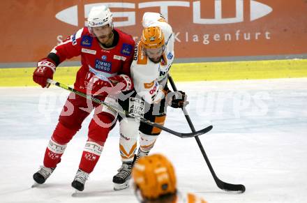 EBEL. Eishockey Bundesliga. KAC gegen	Black Wings Linz. Stefan Geier,  (KAC),  Will Pelletier (Linz). Klagenfurt, am 8.10.2021.
Foto: Kuess
www.qspictures.net

---
pressefotos, pressefotografie, kuess, qs, qspictures, sport, bild, bilder, bilddatenbank