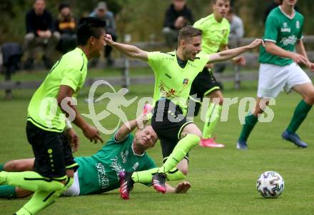 Fussball. 2. Klasse A. Ainet gegen Obermillstatt.  Manuel Hertscheg (Ainet), Georg Oberzaucher (Obermillstatt). Ainet, 3.10.2021.
Foto: Kuess
---
pressefotos, pressefotografie, kuess, qs, qspictures, sport, bild, bilder, bilddatenbank