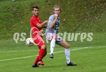 Fussball. Kaerntner Liga. Ferlach Atus gegen Dellach/Gail. Martin Sustersic  (Ferlach),    Lukas Fabian Santner (Dellach). Ferlach, am 9.10.2021.
Foto: Kuess
www.qspictures.net
---
pressefotos, pressefotografie, kuess, qs, qspictures, sport, bild, bilder, bilddatenbank