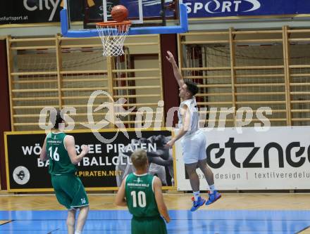 Basketball Zweite Liga 2021/2022. Grunddurchgang 1. Runde.  Woerthersee Piraten gegen Future Team Steiermark. Jure Bavdek (Piraten), Maximilian Seher  (Steiermark). Klagenfurt, am 10.10.2021.
Foto: Kuess
www.qspictures.net

---
pressefotos, pressefotografie, kuess, qs, qspictures, sport, bild, bilder, bilddatenbank