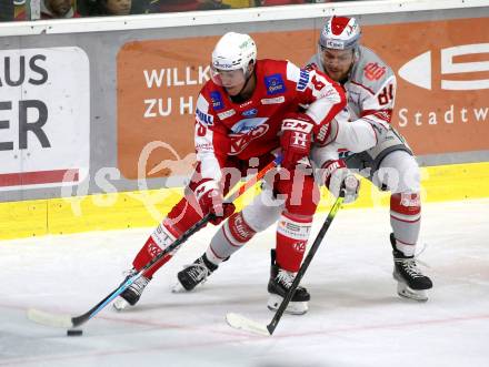 EBEL. Eishockey Bundesliga. KAC gegen	iClinic Bratislava Capitals.  Nicholas Eric Petersen,  (KAC),  Vojtech Zelenak (Bratislava). Klagenfurt, am 15.10.2021.
Foto: Kuess
www.qspictures.net

---
pressefotos, pressefotografie, kuess, qs, qspictures, sport, bild, bilder, bilddatenbank
