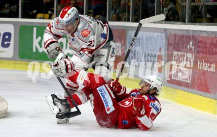 EBEL. Eishockey Bundesliga. KAC gegen	iClinic Bratislava Capitals. Johannes Bischofberger, (KAC),  Samuel Fereta  (Bratislava). Klagenfurt, am 15.10.2021.
Foto: Kuess
www.qspictures.net

---
pressefotos, pressefotografie, kuess, qs, qspictures, sport, bild, bilder, bilddatenbank
