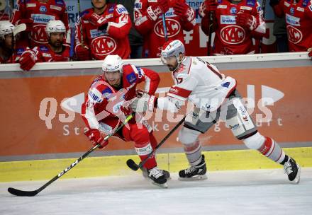 EBEL. Eishockey Bundesliga. KAC gegen	iClinic Bratislava Capitals. Fabian Hochegger,  (KAC), David Buc  (Bratislava). Klagenfurt, am 15.10.2021.
Foto: Kuess
www.qspictures.net

---
pressefotos, pressefotografie, kuess, qs, qspictures, sport, bild, bilder, bilddatenbank