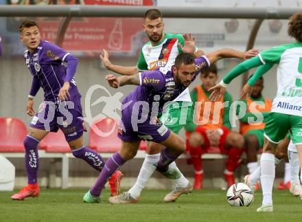 Fussball. Bundesliga. SK Austria Klagenfurt gegen  SK Rapid.  Markus Pink,  (Klagenfurt), Filip Stojkovic (SK Rapid). Klagenfurt, am 16.10.2021.
Foto: Kuess
www.qspictures.net
---
pressefotos, pressefotografie, kuess, qs, qspictures, sport, bild, bilder, bilddatenbank