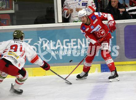 EBEL. Eishockey Bundesliga. KAC gegen	HCB Suedtirol Alperia. Nicholas Petersen,  (KAC), Daniel Frank  (Bozen). Klagenfurt, am 22.10.2021.
Foto: Kuess
www.qspictures.net

---
pressefotos, pressefotografie, kuess, qs, qspictures, sport, bild, bilder, bilddatenbank