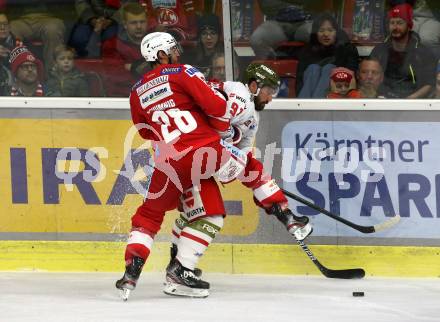 EBEL. Eishockey Bundesliga. KAC gegen	HCB Suedtirol Alperia. Martin Schumnig, (KAC), Michael Halmo   (Bozen). Klagenfurt, am 22.10.2021.
Foto: Kuess
www.qspictures.net

---
pressefotos, pressefotografie, kuess, qs, qspictures, sport, bild, bilder, bilddatenbank