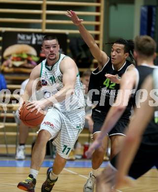 Basketball Zweite Liga 2021/2022. Grunddurchgang 5. Runde.  KOS Celovec gegen Basket Flames. Maximilian Kropf (KOS), Yann Grandperret (Basket Flames). Klagenfurt, am 6.11.2021.
Foto: Kuess
www.qspictures.net
---
pressefotos, pressefotografie, kuess, qs, qspictures, sport, bild, bilder, bilddatenbank