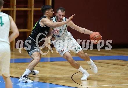 Basketball Zweite Liga 2021/2022. Grunddurchgang 5. Runde.  KOS Celovec gegen Basket Flames. Marko Gutalj (KOS), Fabio Soehnel  (Basket Flames). Klagenfurt, am 6.11.2021.
Foto: Kuess
www.qspictures.net
---
pressefotos, pressefotografie, kuess, qs, qspictures, sport, bild, bilder, bilddatenbank