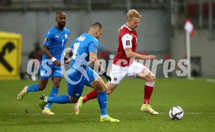 Fussball. FIFA. WM Qualifikationsspiel. European Qualifiers. Oesterreich gegen Israel.  Marco Gruell, (Oesterreich),  Eyad Abu Abaid, Eli Dasa  (Isarael). Klagenfurt, Woerthersee Stadion, 12.11.2021.
Foto: Kuess
---
pressefotos, pressefotografie, kuess, qs, qspictures, sport, bild, bilder, bilddatenbank