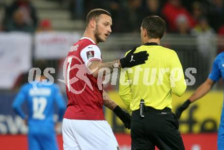 Fussball. FIFA. WM Qualifikationsspiel. European Qualifiers. Oesterreich gegen Israel.  Marko Arnautovic, Schiedsrichter Ovidiu Hategan. Klagenfurt, Woerthersee Stadion, 12.11.2021.
Foto: Kuess
www.qspictures.net
---
pressefotos, pressefotografie, kuess, qs, qspictures, sport, bild, bilder, bilddatenbank