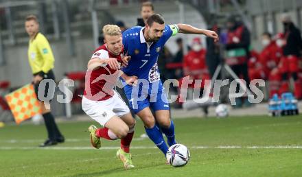 Fussball. FIFA. WM Qualifikationsspiel. European Qualifiers. Oesterreich gegen Moldawien. Marco Gruell,  (Oesterreich), Artur Ionita   (Moldawien). Klagenfurt, Woerthersee Stadion, 15.11.2021.
Foto: Kuess
www.qspictures.net
---
pressefotos, pressefotografie, kuess, qs, qspictures, sport, bild, bilder, bilddatenbank
