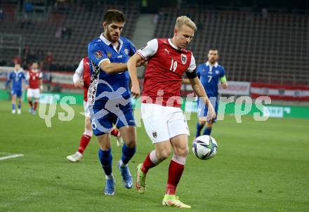 Fussball. FIFA. WM Qualifikationsspiel. European Qualifiers. Oesterreich gegen Moldawien.  Marco Gruell,  (Oesterreich),  Artium Rozgoniuc (Moldawien). Klagenfurt, Woerthersee Stadion, 15.11.2021.
Foto: Kuess
www.qspictures.net
---
pressefotos, pressefotografie, kuess, qs, qspictures, sport, bild, bilder, bilddatenbank