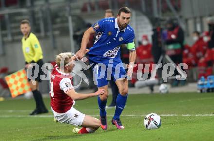 Fussball. FIFA. WM Qualifikationsspiel. European Qualifiers. Oesterreich gegen Moldawien. Marco Gruell,  (Oesterreich), Artur Ionita   (Moldawien). Klagenfurt, Woerthersee Stadion, 15.11.2021.
Foto: Kuess
www.qspictures.net
---
pressefotos, pressefotografie, kuess, qs, qspictures, sport, bild, bilder, bilddatenbank