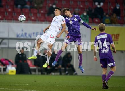 Fussball. Bundesliga. SK Austria Klagenfurt gegen  FK Austria Wien.   Thorsten Mahrer (Klagenfurt), Manfred Fischer (Wien). Klagenfurt, am 21.11.2021.
Foto: Kuess
www.qspictures.net
---
pressefotos, pressefotografie, kuess, qs, qspictures, sport, bild, bilder, bilddatenbank