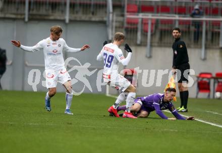 Fussball. Bundesliga. SK Austria Klagenfurt gegen  FK Austria Wien.   Till Sebastian Schumacher (Klagenfurt),  Georg Teigl (Wien). Klagenfurt, am 21.11.2021.
Foto: Kuess
www.qspictures.net
---
pressefotos, pressefotografie, kuess, qs, qspictures, sport, bild, bilder, bilddatenbank