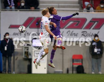 Fussball. Bundesliga. SK Austria Klagenfurt gegen  FK Austria Wien.   Patrick Greil (Klagenfurt), Matthias Braunoeder (Wien). Klagenfurt, am 21.11.2021.
Foto: Kuess
www.qspictures.net
---
pressefotos, pressefotografie, kuess, qs, qspictures, sport, bild, bilder, bilddatenbank
