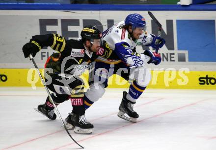 EBEL. Eishockey Bundesliga. VSV gegen spusu Vienna Capitals. Chris Collins,   (VSV), Matthew Neal  (Vienna Capitals). Villach, am 26.11.2021.
Foto: Kuess
www.qspictures.net
---
pressefotos, pressefotografie, kuess, qs, qspictures, sport, bild, bilder, bilddatenbank