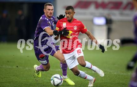 Fussball. Bundesliga. SK Austria Klagenfurt gegen  FC Red Bull Salzburg.   Turgay Gemicibasi,  (Klagenfurt), Antoine Joseph Emmanuel Bernede (Salzburg ). Klagenfurt, am 27.11.2021.
Foto: Kuess
www.qspictures.net
---
pressefotos, pressefotografie, kuess, qs, qspictures, sport, bild, bilder, bilddatenbank