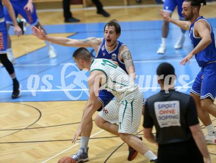 Basketball Zweite Liga 2021/2022. Grunddurchgang 7. Runde.  KOS Celovec gegen Kufstein Towers. Grega Sajevic (KOS), Fabio Thaler  (Kufstein). Klagenfurt, am 27.11.2021.
Foto: Kuess
www.qspictures.net
---
pressefotos, pressefotografie, kuess, qs, qspictures, sport, bild, bilder, bilddatenbank