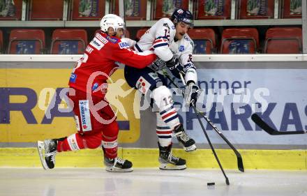 EBEL. Eishockey Bundesliga. KAC gegen	Hydro Fehervar AV 19. Thomas Vallant,  (KAC), Braeden Shaw  (Fehervar). Klagenfurt, am 28.11.2021.
Foto: Kuess
www.qspictures.net

---
pressefotos, pressefotografie, kuess, qs, qspictures, sport, bild, bilder, bilddatenbank