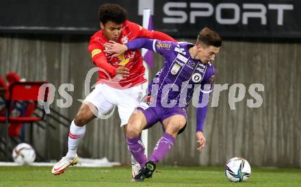 Fussball. Bundesliga. SK Austria Klagenfurt gegen  FC Red Bull Salzburg.   Till Schumacher,  (Klagenfurt), Karim Adeyemi (Salzburg ). Klagenfurt, am 27.11.2021.
Foto: Kuess
www.qspictures.net
---
pressefotos, pressefotografie, kuess, qs, qspictures, sport, bild, bilder, bilddatenbank