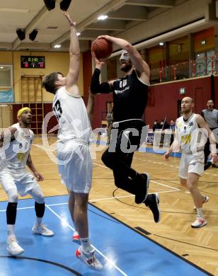Basketball Zweite Liga 2021/2022. Grunddurchgang 8. Runde.  Woerthersee Piraten gegen RAIDERS Tirol.  Alexander Pirker (KOS), Leon Tomic (Tirol). Klagenfurt, am 4.12.2021. 
Foto: Kuess
www.qspictures.net

---
pressefotos, pressefotografie, kuess, qs, qspictures, sport, bild, bilder, bilddatenbank