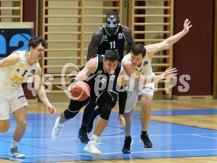 Basketball Zweite Liga 2021/2022. Grunddurchgang 8. Runde.  Woerthersee Piraten gegen RAIDERS Tirol.  Jan-Arne Apschner (KOS), Stefan Oberhauser (Tirol). Klagenfurt, am 4.12.2021. 
Foto: Kuess
www.qspictures.net

---
pressefotos, pressefotografie, kuess, qs, qspictures, sport, bild, bilder, bilddatenbank