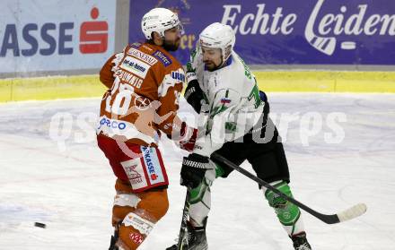 EBEL. Eishockey Bundesliga. KAC gegen	HK SZ Olimpija. Martin Schumnig, (KAC),  Nik Simsic  (Olimpija). Klagenfurt, am 7.12.2021.
Foto: Kuess
www.qspictures.net

---
pressefotos, pressefotografie, kuess, qs, qspictures, sport, bild, bilder, bilddatenbank
