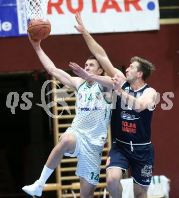 Basketball Zweite Liga 2021/2022. Grunddurchgang 9. Runde.  KOS Celovec gegen BBC Nord Dragonz. Marko Gutalj (KOS), Jordan David Roberts (BBC Nord Dragonz). Klagenfurt, am 11.12.2021.
Foto: Kuess
www.qspictures.net
---
pressefotos, pressefotografie, kuess, qs, qspictures, sport, bild, bilder, bilddatenbank
