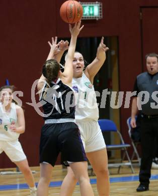 Basketball Damen Superliga 2021/2022. Grunddurchgang 7. Runde.  KOS Celovec Damen gegen  Vienna United. Sara Feratovic  (KOS),  Marie-Christine Loderer (Vienna United). Klagenfurt, am 11.12.2021.
Foto: Kuess
www.qspictures.net
---
pressefotos, pressefotografie, kuess, qs, qspictures, sport, bild, bilder, bilddatenbank