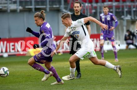 Fussball. Bundesliga. SK Austria Klagenfurt gegen  SK Puntigamer Sturm Graz.  Patrick Greil,  (Klagenfurt), Alexander Prass (Graz). Klagenfurt, am 12.12.2021.
Foto: Kuess
www.qspictures.net
---
pressefotos, pressefotografie, kuess, qs, qspictures, sport, bild, bilder, bilddatenbank